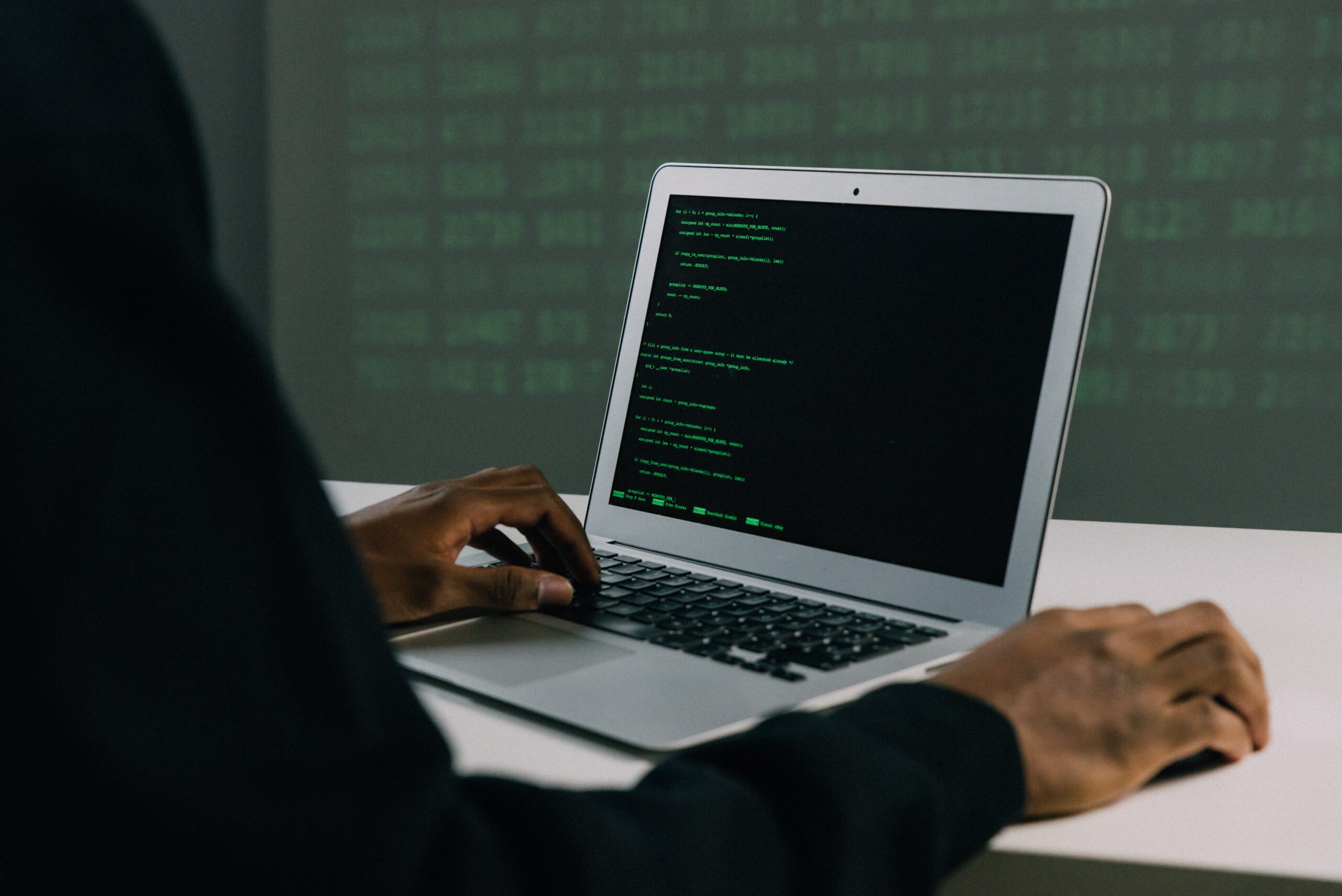 Person using Macbook Air