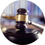 A judge's gavel expertly positioned on top of a book, symbolizing the seamless harmony between Managed IT and Network Support.