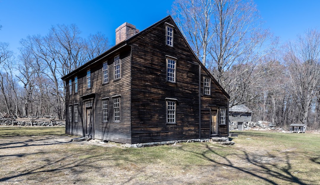 An old black house sits in the middle of a wooded area, managed it services burlington. An old black house sits in the middle of a wooded area, managed it services burlington.