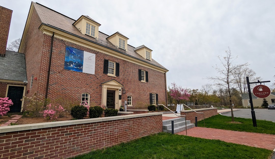 A brick building with a sign for Managed IT Services Concord. A brick building with a sign for Managed IT Services Concord.