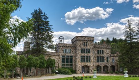 A stone building with a bell tower surrounded by trees near Managed IT Services in Mansfield. A stone building with a bell tower surrounded by trees near Managed IT Services in Mansfield.